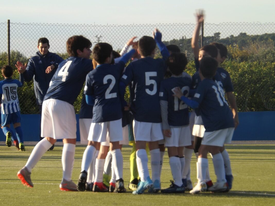 Equipo fútbol corro